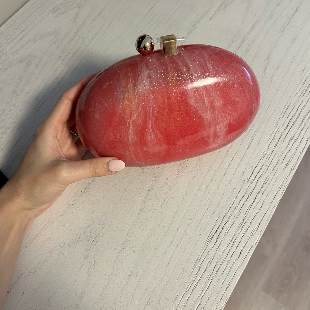 Pink Oval Clutch with Gold Accents
